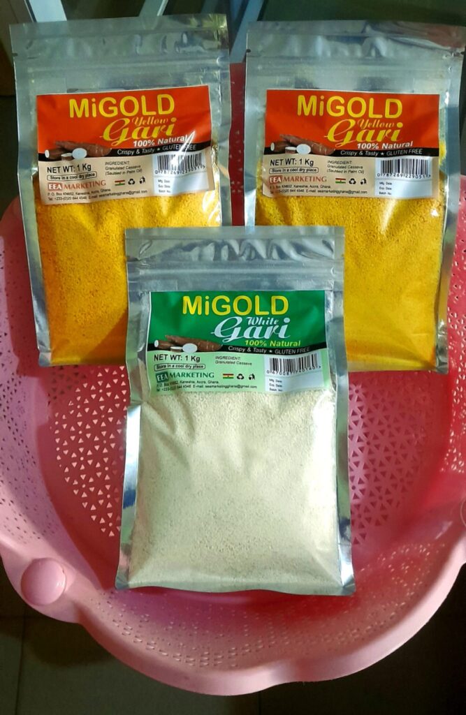 Two yellow and one white MiGold Gari in packets displayed in a plastic basket