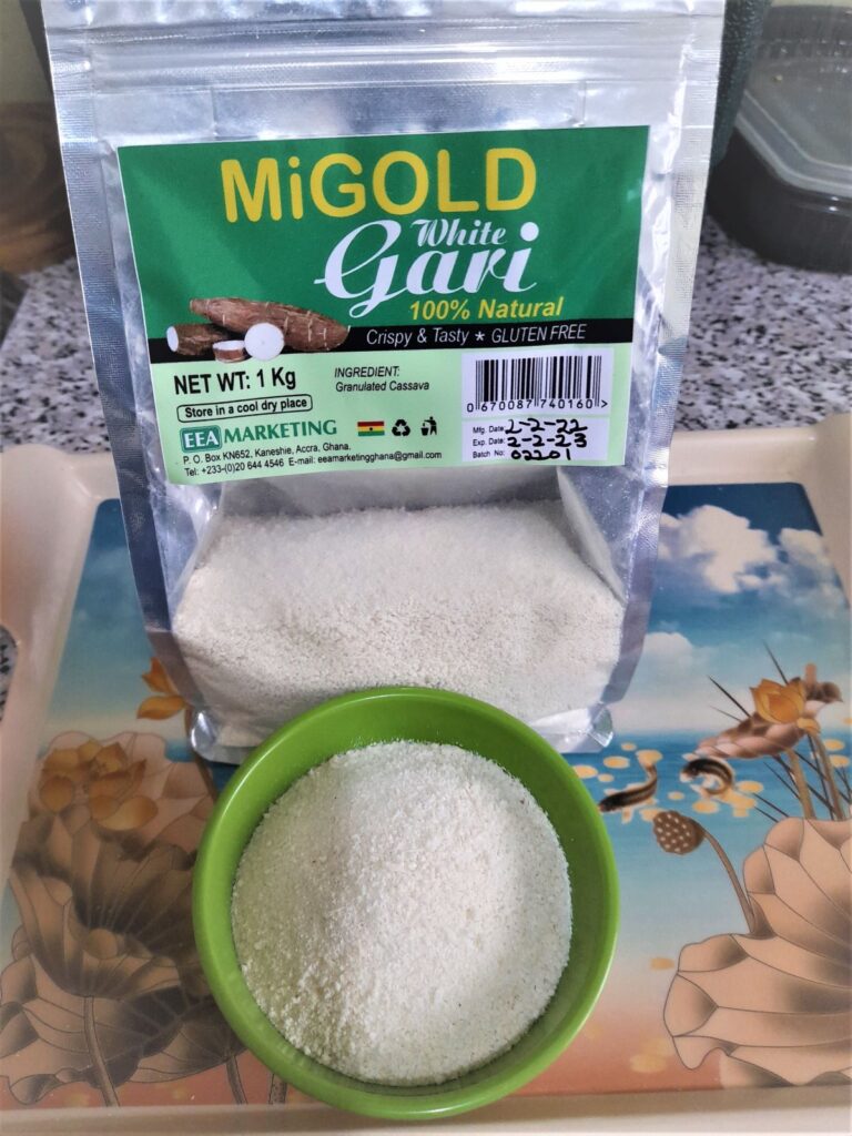MiGold White Gari in a transparent packet with sample in a small bowl in front.