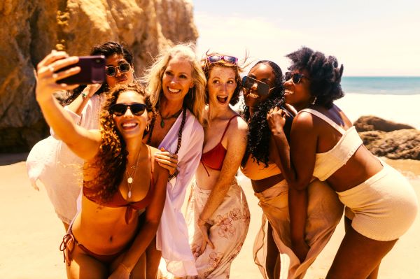 Ladies taking a selfie at the beach
